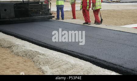 Road roller on asphalt pavement works. Barcelona. Spain. Stock Photo