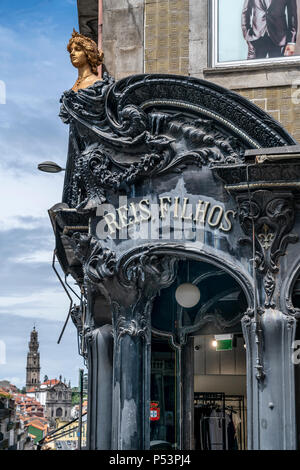 Detail of Reis & Filhos store, Rua de 31 de Janeiro Art Noveau Porto, background Clerigos church, Portugal Porto, Portugal Stock Photo
