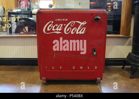 Coca cola antique cooler atthe local store. Stock Photo