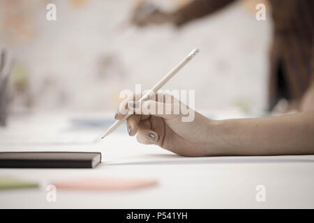 Team succes. Photo young business managers working with new startup project. Stock Photo