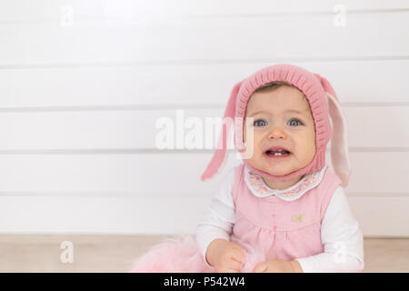 Happy baby bunny pink having Stock Photo