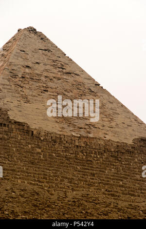 Limestone casing stones still cover the top of the Pyramid of Khafre (Chephren), the second largest of the Egyptian pyramids at Giza. Stock Photo