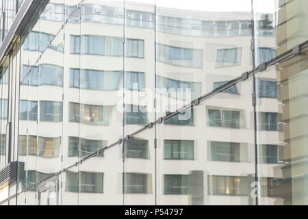 glass wall of office building with reflect Stock Photo