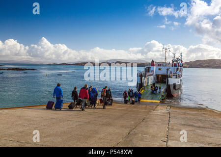 The slipway at Baile Mor with the ‘Loch Buie’ ferry loading visitors leaving the Hebridean island of Iona, Argyll and Bute, Scotland, UK Stock Photo