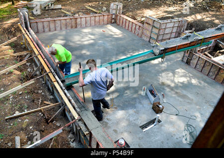 Pouring foundation wall for home addition Stock Photo