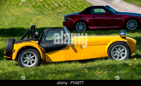 A yellow Caterham sports car Stock Photo