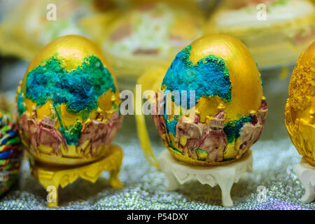 Beautiful Ester egg with Thai pattern. Handwriting inscription Happy Easter in Thai Style patterns. Stock Photo