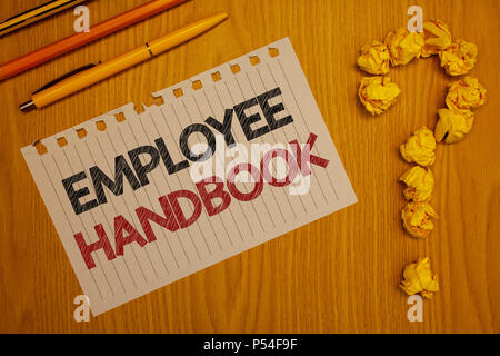 Conceptual hand writing showing Employee Handbook. Business photo text Document Manual Regulations Rules Guidebook Policy Code Words written Note Desk Stock Photo