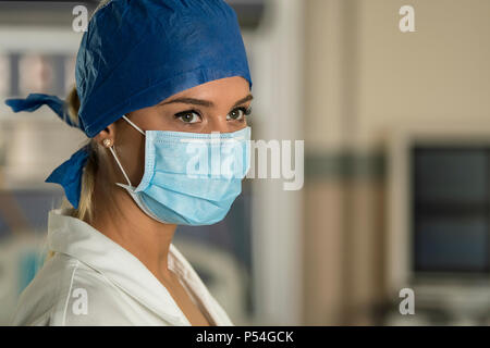 Blonde young nurse doctor in ICU ER OR room Stock Photo