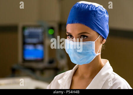 Doctor Face And Blue Eyes In Healthcare Medical Or Surgeon With