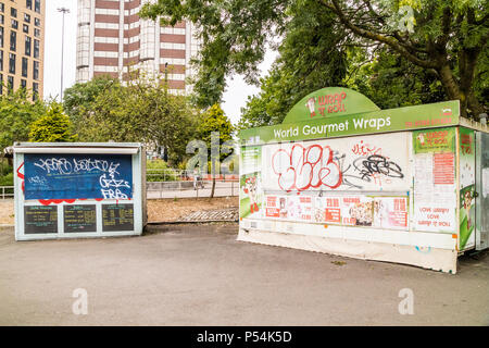 Fastfood outlets in a underpass covered in graffiti, Birmingham, UK Stock Photo