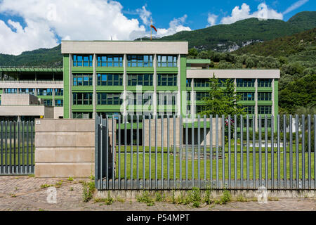 Hospital of Arco - Trento - Trentino Alto Adige - Italy: a modern building surrounded by trees. Exterior of the modern hospital. Stock Photo