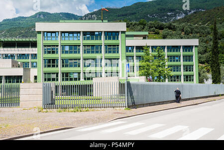 Hospital of Arco - Trento - Trentino Alto Adige - Italy: a modern building surrounded by trees. Exterior of the modern hospital. Stock Photo