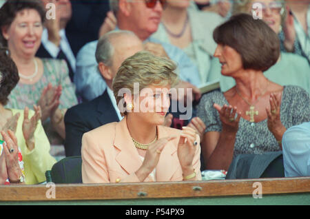 HRH The Princess of Wales, Princess Diana, attends the 1993 Men's Singles Wimbledon Tennis Final.   In other frames in this set, The Princess is shown sitting next to her mother Frances Shand Kydd.  Regarding the match, Pete Sampras defeated Jim Courier 7 – 6, 7 - 6, 3 – 6, 6 –3 in the final to win the Gentlemen's Singles title at the 1993 Wimbledon Championships. This was the first of Pete's Open Era record of seven Wimbledon titles.  Picture taken 4th July 1993 Stock Photo