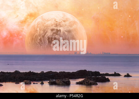 Fantasy landscape - modern city skyline across sea with rock formations on the foreground and huge alien planet in orange sky. Elements of this image  Stock Photo