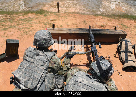 Soldiers of Alpha Company, 703rd Brigade Support Battalion, 2nd Infantry Brigade Combat Team, 3rd Infantry Division engage targets with an M240B machine gun May 9th, 2017 at Fort Stewart, Ga. Stock Photo