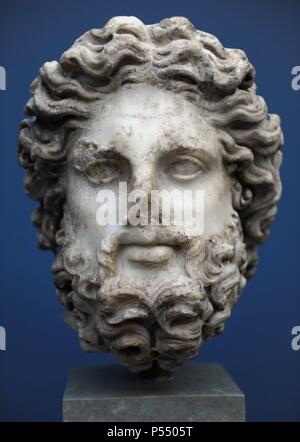 Zeus. Rome. Late 2nd century AD. Marble. The long hair and curly beard belong to one of the father gods. Traces of red colour in the hair and beard show that the statue was painted. Ny Carlsberg Glyptotek. Copenhagen, Denmark. Stock Photo