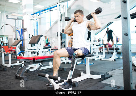 Handicapped Sportsman Training in Gym Stock Photo