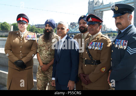 London,UK,25th June 2018,The Mayor of London, Sadiq Khan and Chairman of the London Assembly, Tony Arbour welcomed members of the British Armed Forces, cadets, veterans and representatives from various military charities and welfare organisations today for a Armed Forces Day flag raising ceremony at City Hall. Credit: Keith Larby/Alamy Live News Stock Photo