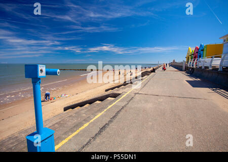 People enjoying a walk along Prestatyn Promenade and beach goers during a heat wave, North Wales, UK Stock Photo