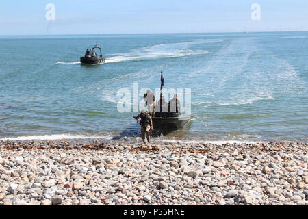 Llandudno, Wales. 25th June 2018.  The Royal engineers delivering the flag for the official  start of  the celebrations of  armed forces day in Llandudno, Credit: michael clarke/Alamy Live News Stock Photo