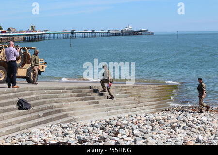 Llandudno, Wales. 25th June 2018.  The Royal engineers delivering the flag for the official  start of  the celebrations of  armed forces day in Llandudno, Credit: michael clarke/Alamy Live News Stock Photo