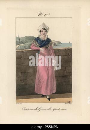 Costume of Granville. A woman in her finery. This hairstyle is called the 'conine.' It is extraordinary that this simple style can appear so elegant. The bonnet is made of batiste or organdy. It is paired with a beautiful shawl, and sometimes a silk dress. Hand-colored fashion plate illustration by Lante engraved by Gatine from Louis-Marie Lante's 'Costumes des femmes du Pays de Caux,' 1827/1885. With their tall Alsation lace hats, the women of Caux and Normandy were famous for the elegance and style. Stock Photo