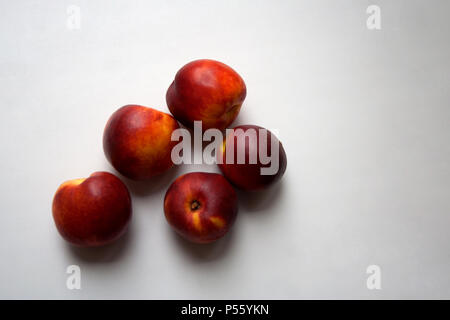 Nectarine fruits isolated on white background close up Stock Photo