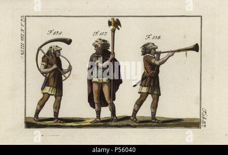 Roman military aquilifer or signifer (standard-bearer) with the aqulia or signum (standard) of the legion, trumpeter and horn player, all wearing lion heads and carrying swords (gladius). Handcolored copperplate engraving from Robert von Spalart's 'Historical Picture of the Costumes of the Principal People of Antiquity and of the Middle Ages' (1798). Stock Photo