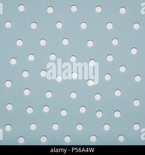 White pills on blue pastel colored background. Medication and prescription pills minimal background. Stock Photo