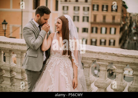 A newly married couple pose for a selfie photo near the Bridge of Sighs in  Venice Italy Stock Photo - Alamy
