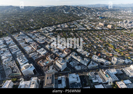 Afternoon aerial view of Beverly Hills streets with mid Wilshire and ...