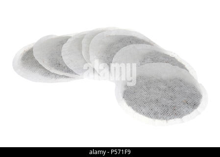 isolated row of round tea bags Stock Photo