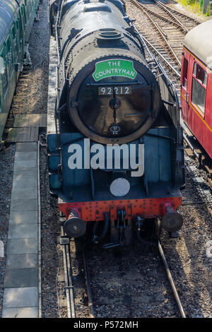 Preserved BR Standard Class 9F locomotive 92212 currently in use by Mid Hants Railway here pictured in Arlesford in Hampshire 2018, England, UK Stock Photo