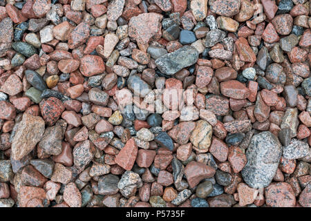 Colourful wet pebbles on the seashore at the baltic sea. Sweden Stock Photo