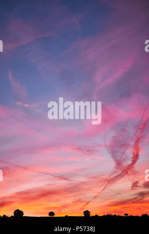 Sunset over Yorkshire on a summer evening with a range of collars lighting up the sky. Stock Photo