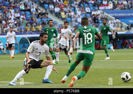 Volgograd, Russia. 25th June, 2018. Egypt's Ahmed Fathy (L) battles for the ball with Saudi Arabia's Salem Al-Dawsari during the FIFA World Cup 2018 Group A soccer match between Saudi Arabia and Egypt at the Volgograd Arena in Volgograd, Russia, 25 June 2018. Credit: Ahmed Ramadan/dpa/Alamy Live News Stock Photo