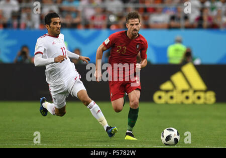 Saransk, Russia. 25th June, 2018. Soccer: FIFA World Cup 2018, Iran vs Portugal, group stages, group B, 3rd matchday: Iran's Vahid Amiri (L) and Portugal's Adrien Silva vie for the ball. Credit: Andreas Gebert/dpa/Alamy Live News Stock Photo