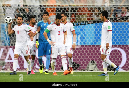 Saransk, Russia. 25th June, 2018. Soccer: FIFA World Cup 2018, Iran vs Portugal, group stages, group B, 3rd matchday: Iran's Ehsan Hajsafi (C) and his teammates appear disappointed after the 0-1 counter-goal. Credit: Andreas Gebert/dpa/Alamy Live News Stock Photo