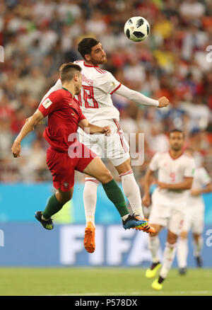 (180625) -- SARANSK, June 25, 2018 (Xinhua) -- Raphael Guerreiro (L) of Portugal competes for a header with Alireza Jahanbakhsh of Iran during the 2018 FIFA World Cup Group B match between Iran and Portugal in Saransk, Russia, June 25, 2018. (Xinhua/Fei Maohua) Stock Photo