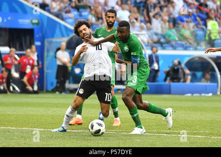 Volgograd, Russland. 25th June, 2018. Mohamed SALAH (EGY), Action, duels versus Osama HAWSAWI (KSA), Saudi Arabia (KSA) Egypt (EGY) 2-1, Preliminary Round, Group A, Match 34, on 25.06.2018 in Volgograd, Volgograd Arena. Football World Cup 2018 in Russia from 14.06. - 15.07.2018. | usage worldwide Credit: dpa/Alamy Live News Stock Photo