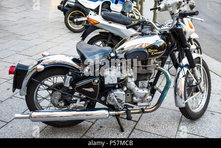 Bullet 500, Royal Enfield classic motorbike parked on pavement, side view, France, Europe Stock Photo