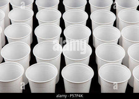 Plastic cups, many different types, shapes, colors, disposable cups, plastic waste, Stock Photo