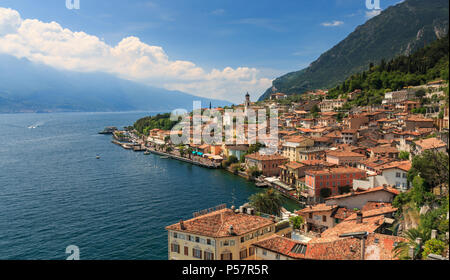 Panoramic view of small town Limone sul Garda at Lake Garda west shore on a sunny day in springtime