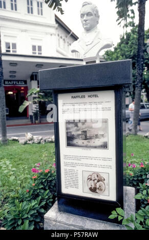 The famed Raffles Hotel in Singapore honors its namesake with a bust of Sir Thomas Stamford Raffles, who is regarded as the founder of that Southeast Asian island nation in 1819. Information on the sculpture's pedestal describes the brothers from Armenia who opened the historic hotel in 1887. Since that time it has expanded from a 10-room hostelry to a luxurious grand hotel that underwent its most recent restoration in 2018. The Raffles is well known for its signature alcoholic drink, the Singapore Sling, a refreshing gin-based cocktail first concocted more than a century ago. Stock Photo