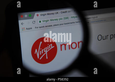 The Virgin Money website seen through a magnifying glass Stock Photo