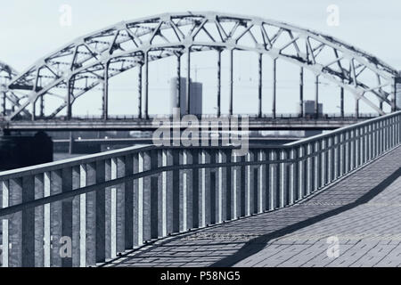 Graphics of lines of bridges and handrails in a modern city from glass and concrete. Riga Stock Photo