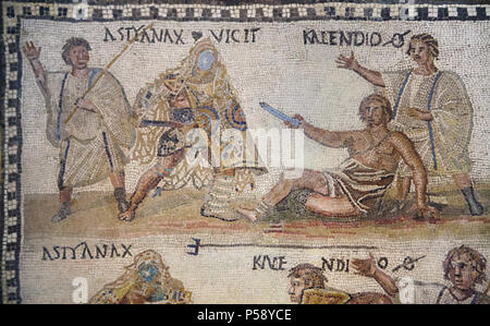 Gladiator fight depicted in the Roman mosaic from the 3rd century AD on display in the National Archaeological Museum (Museo Arqueológico Nacional) in Madrid, Spain. The secutor (Roman armed gladiator) fighting versus the retiarius (Roman net fighter). According to the Latin inscription, the secutor Astyanax and the retiarius Kalendio are engaged in mortal combat. The lanista (gladiator trainer) cheers them on. Stock Photo