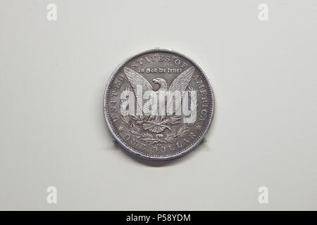 US one dollar silver coin (1880) on display in the National Archaeological Museum (Museo Arqueológico Nacional) in Madrid, Spain. Stock Photo