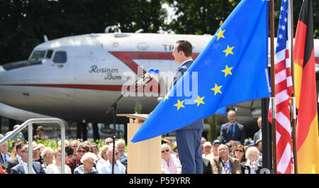 Frankfurt am Main, Germany. 26th June, 2018. Richard Grenell, American ambassador to Germany holds a speech during the 70th jubilee of the Berlin air bridge at the memorial site at the Frankfurt Airport. The air bridge served as the supply of West Berlin through the western Allies during the Berlin blockade through the soviet occupation force from the 24th of June 1948 until the 12th of May 1949. Photo: Arne Dedert/dpa  Stock Photo